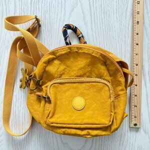 mustard yellow minion mini backpack kipling
